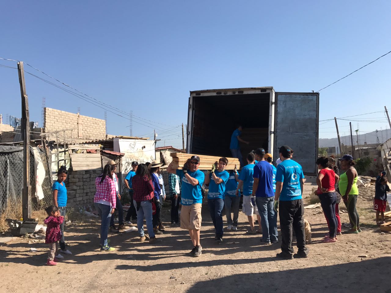 Arpin Strong, helps unload a truck while building homes for the homeless in Guadalajara Mexico. Arpin Strong, helps unload a truck while building homes for the homeless in Guadalajara Mexico.