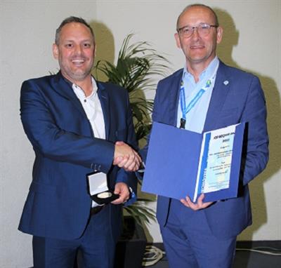 Liam Witham of PSS in London receives the EUROMOVERS award as top booker